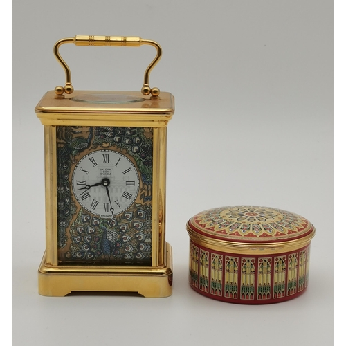 97 - A brass carriage clock, the gilt dial signed HALCYON DAYS ENAMELS and decorated with peacocks, with ... 