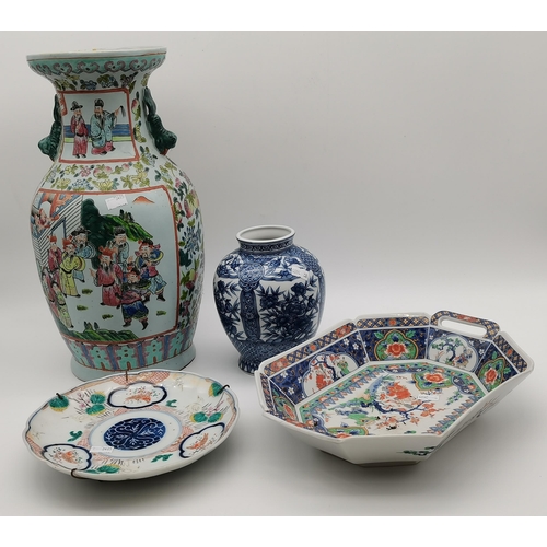 99 - A small collection of assorted oriental ceramics comprising a famille verte plate decorated with cra... 