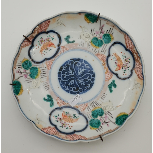 99 - A small collection of assorted oriental ceramics comprising a famille verte plate decorated with cra... 