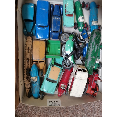 753A - A collection of Dinky and other die-cast toys, including military vehicles, racing cars, a boxed Goo... 