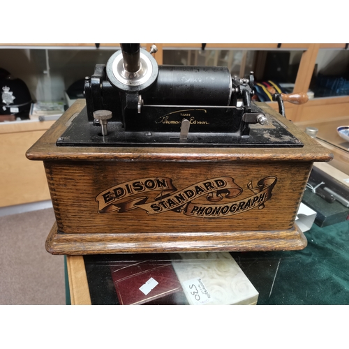 62 - An Edison Standard Phonograph, serial no. S78917, in wooden carry case; together with two boxes of p... 