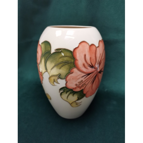 96 - A Cream Moorcroft Vase in Hibiscus design H19.5cm signature to base