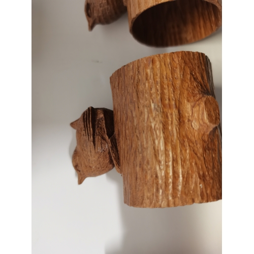 199 - Bob Hunter, a set of six Wrenman oak napkin rings, each with carved wren signature atop a hollowed o... 