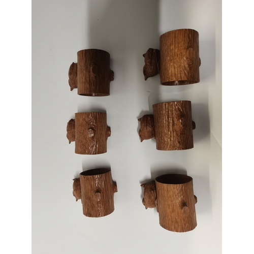 199 - Bob Hunter, a set of six Wrenman oak napkin rings, each with carved wren signature atop a hollowed o... 