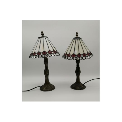 29 - A pair of modern Tiffany-style table lamps, the conical shades opaque white with red, clear glass be... 