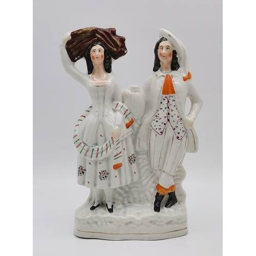 11 - One Flatbacked Staffordshire figurine of couple at Harvest H 32cm plus Staffordshire Spill Vase 'rob... 