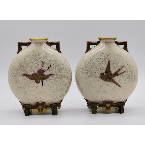 160 - A pair of Royal Worcester porcelain Japanese style moon flask vases, late 19th Century, with speckle... 