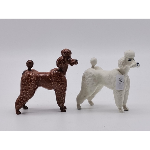 182 - Two Beswick Poodles one white and one BrownCondition StatusGood: In good condition overall, but poss... 