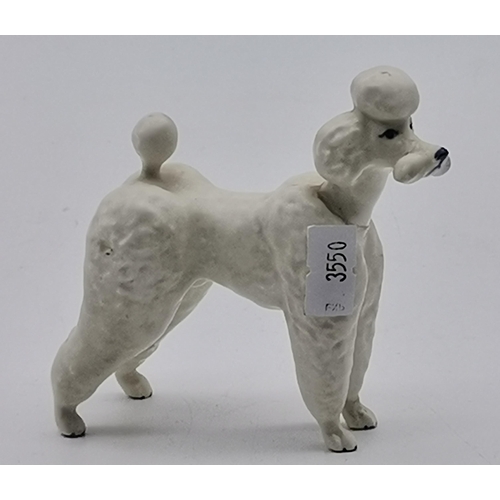 182 - Two Beswick Poodles one white and one BrownCondition StatusGood: In good condition overall, but poss... 