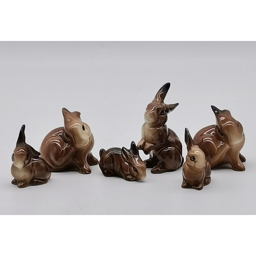 197 - A collection of Beswick animals - Standing Fox, Laying Down Fox 1019, Small sitting fox and 6 brown ... 