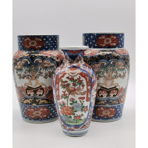 210 - A Pair of Japanese Imari Vases H25.5cm plus one otherCondition StatusGood: In good condition overall... 