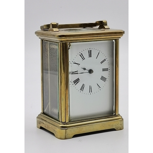 214 - Brass Carriage Clock with key H10.5cmCondition StatusGood: In good condition overall, but possibly s... 