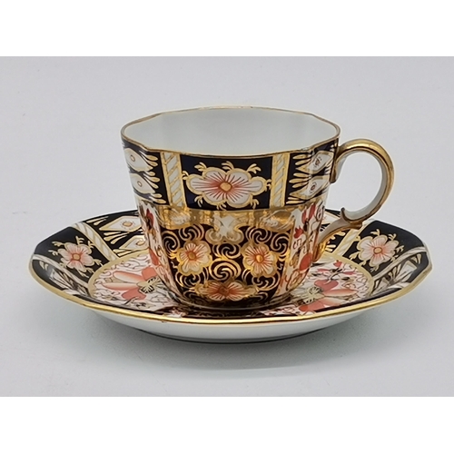 216 - 4 pieces of Royal Crown Derby Imari pattern - Coffee can and saucer, Tea cup and saucer, Miniature p... 