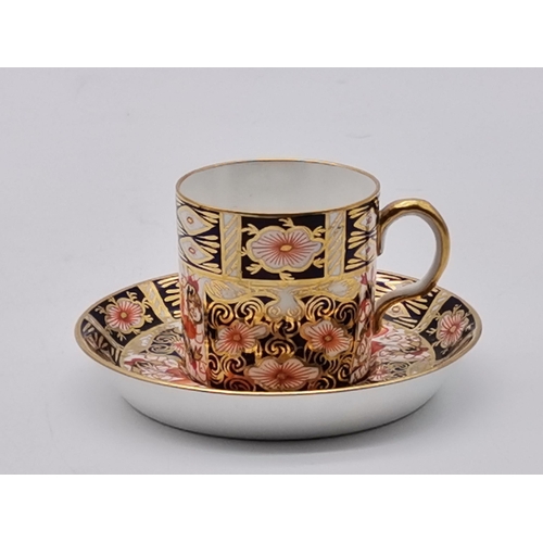 216 - 4 pieces of Royal Crown Derby Imari pattern - Coffee can and saucer, Tea cup and saucer, Miniature p... 