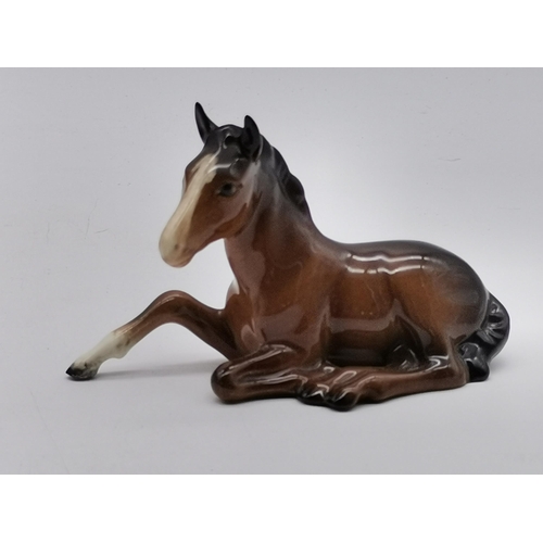 223 - Beswick Two bay horses and Two foalsCondition StatusGood: In good condition overall, but possibly so... 