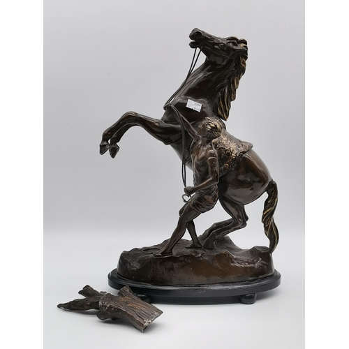 37 - A Pair of Bronzed Metal Marly horses stamped A.S & Co made in England (A/F)Condition StatusGood: In ... 