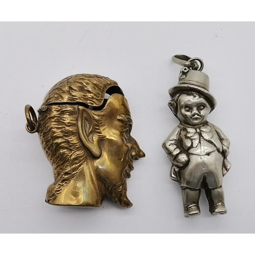 505 - A novelty brass push-nose vesta case of Lucifer, the horned devil, (a/f); together with an early 20t... 