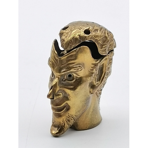 505 - A novelty brass push-nose vesta case of Lucifer, the horned devil, (a/f); together with an early 20t... 