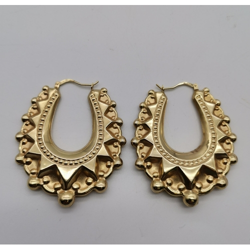 520 - A large pair of Italian 9 carat gold horseshoe hoop earrings, hallmarked 375. 47mm by 41mm, 6.0g gro... 