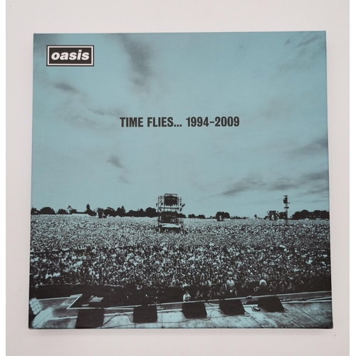 535 - Oasis 'Time Flies' 1994-2009 the complete Oasis singles collection boxset 5x12