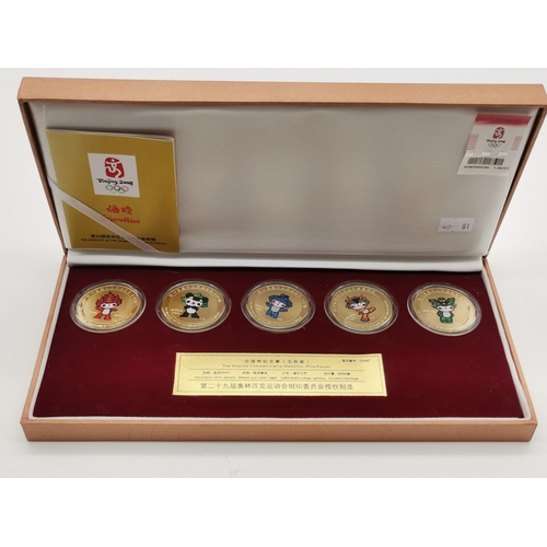 544 - Beijing Olympics 2008, a limited edition set of five gold-plated commemorative Mascot medallions, 'T... 