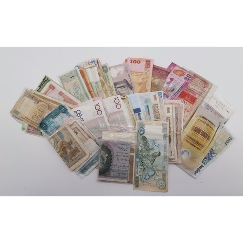 545 - A quantity of assorted foreign currency bank notes, including France, China, Egypt, Libya, Yugoslavi... 