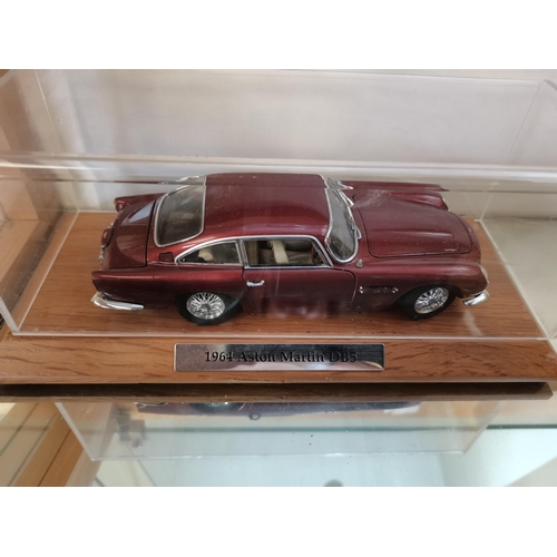 275 - A collection of model cars and car part