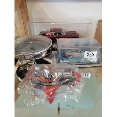 275 - A collection of model cars and car part