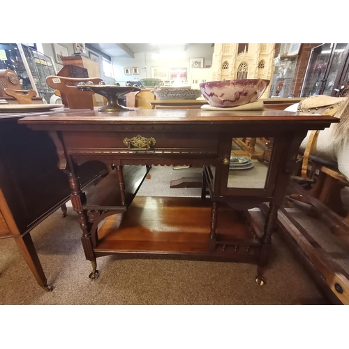 676 - A Victorian mahogany desk in the manner of Gillows of Lancaster with claw feet and glass ball decora... 