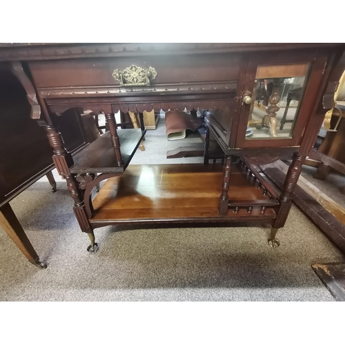 676 - A Victorian mahogany desk in the manner of Gillows of Lancaster with claw feet and glass ball decora... 