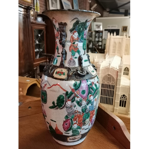 683 - A Chinese Nankin 19th century 45cm vase with battle scenes decoration (A/F)Condition StatusFair: In ... 