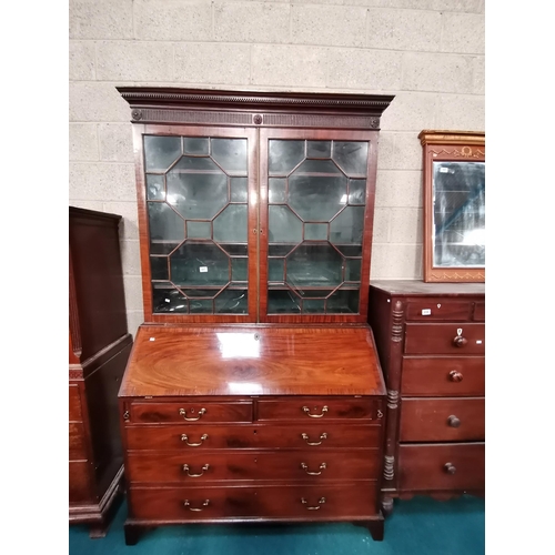 857 - Georgian Mahogany Bureau Bookcase with carved cornice above glazed doors opening to reveal three adj... 