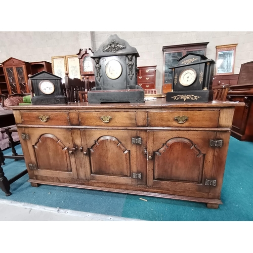 892 - Antique Oak sideboard with 3 drawers with original brass handles and 3 cupboards under.  4 panells t... 