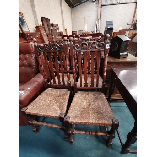 897 - Set of 4 antique oak rush seated dining chairsCondition StatusGood: In good condition overall, but p... 