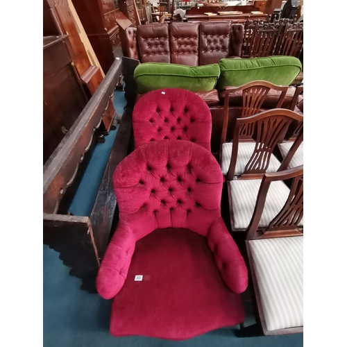 906 - A Pair of Toad Style chairs button back upholstered in a Raspberry coloured fabricCondition StatusGo... 