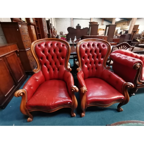 919 - A Pair of Mahogany framed red leather  button back armchairsCondition StatusGood: In good condition ... 