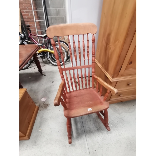 935 - Ladder Back pine rocking chairCondition StatusGood: In good condition overall, but possibly some or ... 