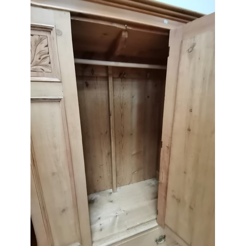 960 - Antique Double pine wardrobe with single mirrored door sat on single drawer base and carved leaf pat... 