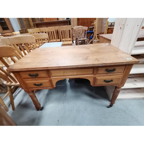 985 - Antique Pine Writing desk sat on castors with brass swan necked handles 106cm x 60cmCondition Status... 