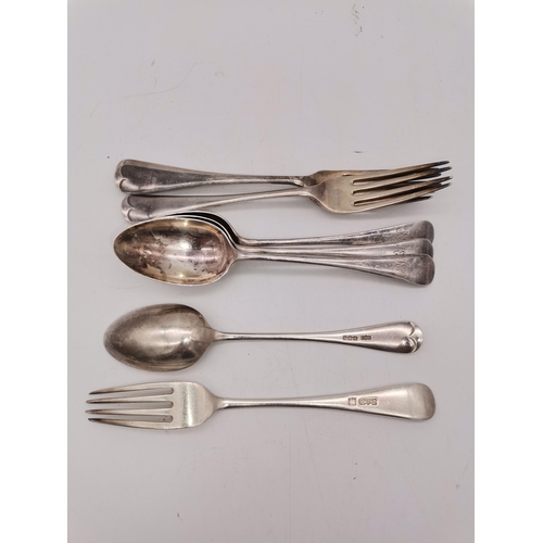 412A - A set of four Edwardian silver dessert spoons by James Dixon & Sons Ltd, Sheffield 1904, Old English... 