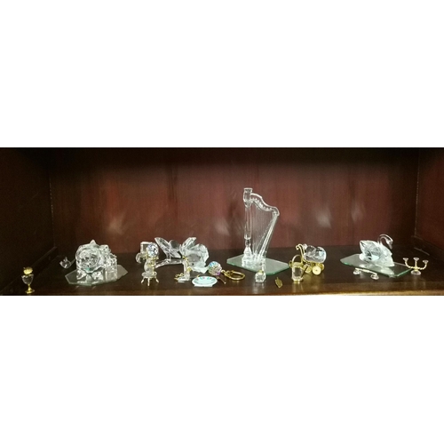 131a - A Large Collection of Swarovski Crystal collectables including animals Train etc