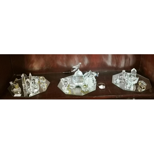 131a - A Large Collection of Swarovski Crystal collectables including animals Train etc