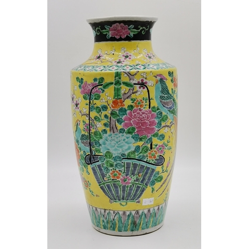 164 - A Chinese 37cm porcelain vase 19th century in a brilliant and vibrant yellow back ground and having ... 