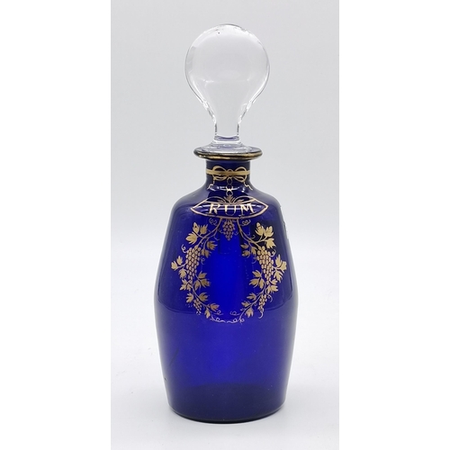 168 - Bristol Blue Glass Rum Decanter with Gilt decoration (not original stopper) H18cm (bottle only)Condi... 