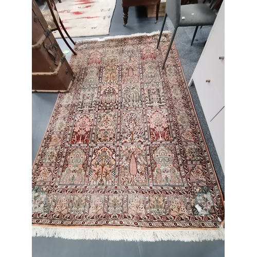 1149a - A vintage possibly silk rug 2.5m x 1.5m very highly decorated with tree and temples