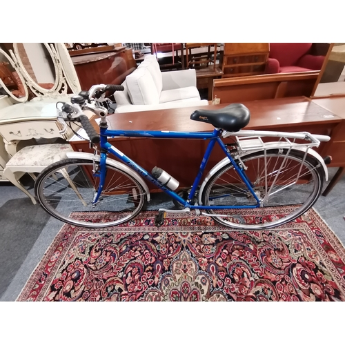 1168a - A gents RALEIGH  PIONEER road bike in blueCondition StatusGood: In good condition overall, but possi... 