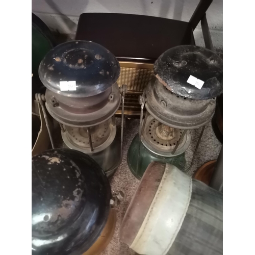 743 - Collection of vintage items - oil lanterns, heaters, brassware, 1940s blow butter churn, Golf clubs ... 