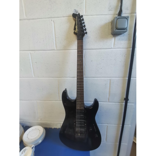 745 - Squier Showmaster by Fender electric guitar Condition StatusGood: In good condition overall, but pos... 