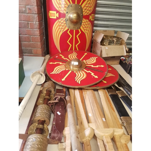 753 - Quantity of Battle re-enactment shields, swords,spears tools etc - Large Roman Shield, 2 oval Roman ... 