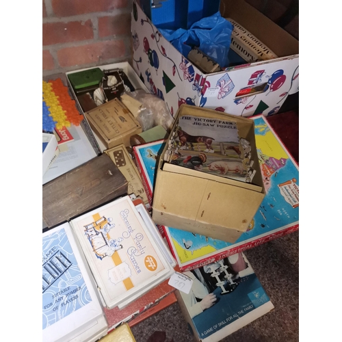 789 - Quantity of vintage games, Vintage rag doll and highchair,  jigsaws and items incl The 